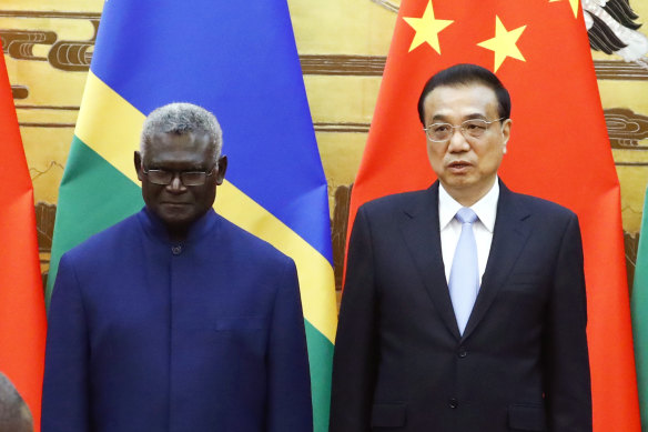 Solomon Islands Prime Minister Manasseh Sogavare and Chinese Premier Li Keqiang in Beijing in 2019.