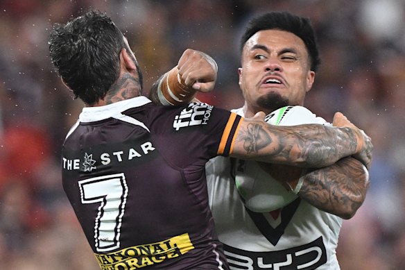 Spencer Leniu takes on Brisbane’s Adam Reynolds in his last visit to Suncorp Stadium.