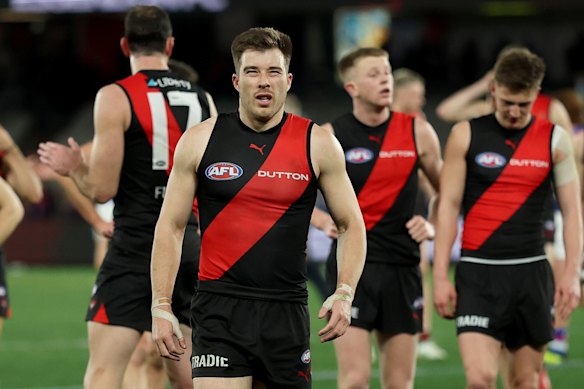 How much more pain can star Bombers skipper Zach Merrett endure?