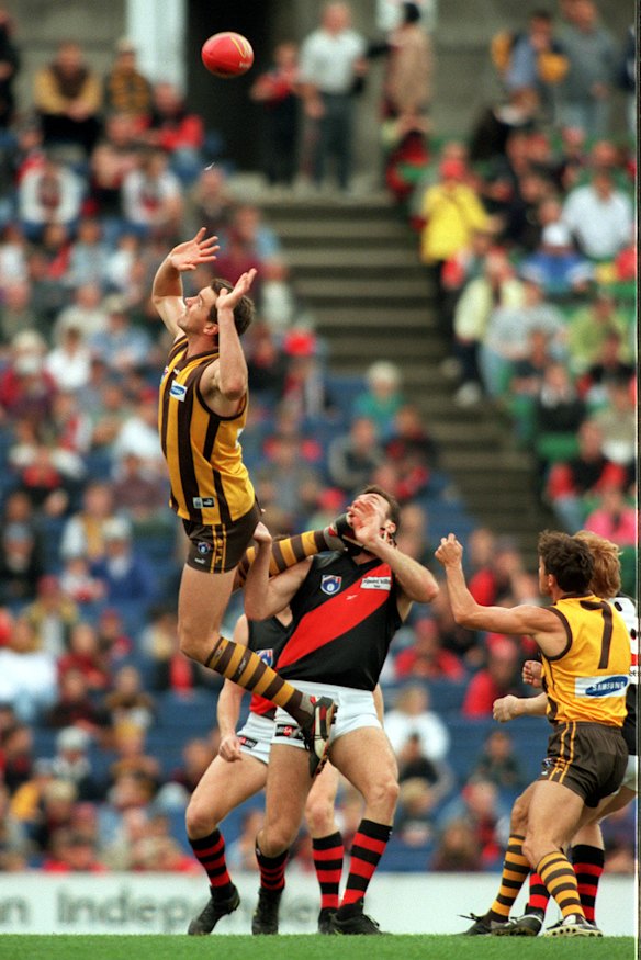 Salmon, in Hawthorn colours, playing against his old team.