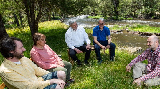 Catholic priest John Dupuche (in white) who is a tantra meditation expert and Catholic priest with member of his multi-faith ashram. 
