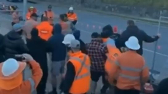 CFMEU workers block people from accessing a Cross River Rail site on Wednesday.