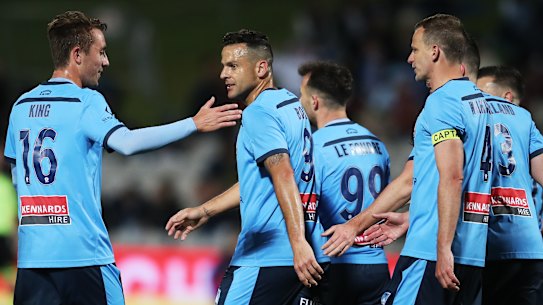 Bobo gets the congratulations after his tap-in put Sydney in front. 