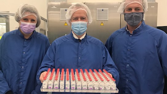 Bill Shorten, centre, visits the CSL facility producing the AstraZeneca coronavirus vaccine.