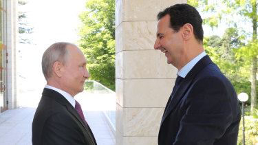 Assad meets with Russian President Vladimir Putin in Sochi, Russia, in May.