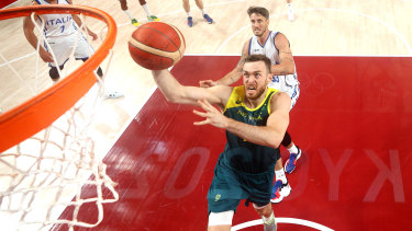 Nick Kay drives to the basket in the Boomersâ tense win over Italy.