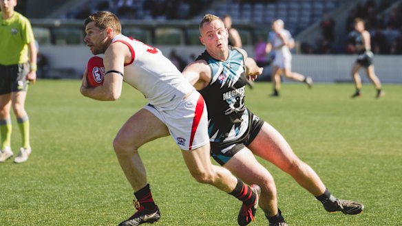 Eastlake's Daniel Ryall evades Daniel Posch.