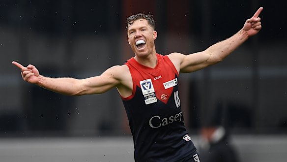Jake Melksham celebrates a goal in the VFL grand final.