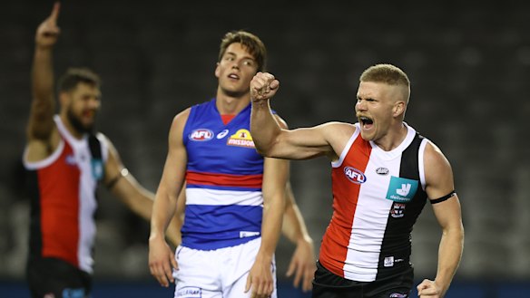 Fit and firing: Dan Hannebery celebrates a major for the Saints against the Western Bulldogs at Marvel Stadium.