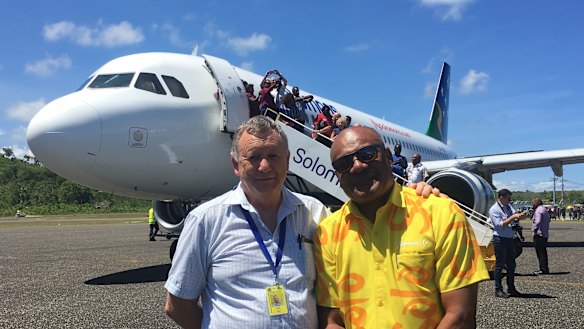 Solomon Airlines chief executive Brett Gebers and Tourism Solomons chief executive Josefa Tuamoto on the tarmac in Munda. 