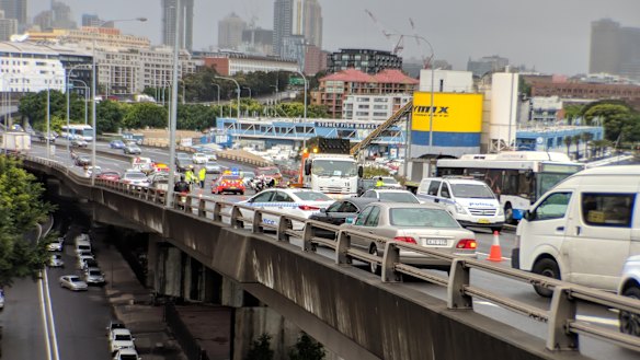 A serious motorcycle crash on the Western Distributor closed three city-bound lanes.