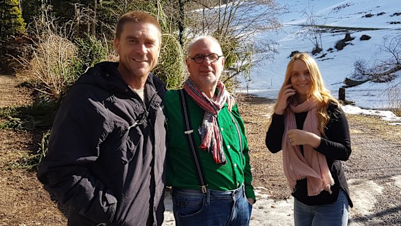 Victorian firefighter Troy Thornton with his wife Christine and Dr Philip Nitschke. 