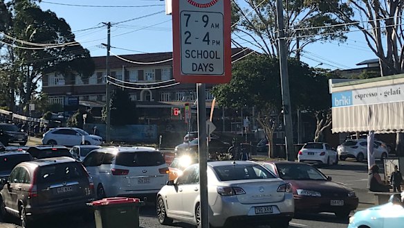 The crowded school pick-up at Ironside State School.
