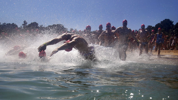 Competitors take the plunge at the start of the Cole Classic.