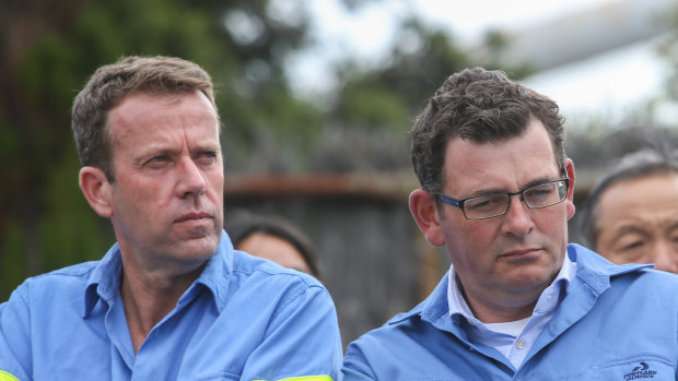 Cracks emerge in the national unity: Federal Education Minister Dan Tehan and Victorian Premier Daniel Andrews. 