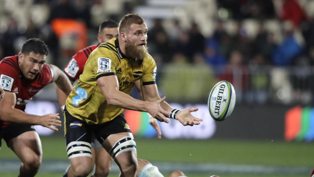 Brad Shields, passing the ball, during his playing days with the Hurricanes.