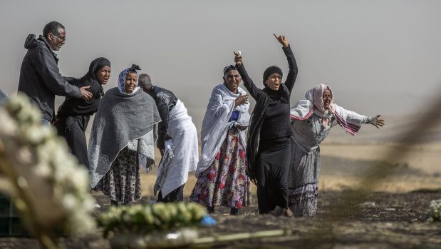 Ethiopian relatives of crash victims grieve at the site where the Ethiopian Airlines Boeing 737 Max 8 crashed shortly after takeoff last Sunday killing all 157 on board, near Bishoftu, south-east of Addis Ababa, in Ethiopia.