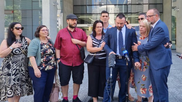 The family of slain couple Frank and Loris Puglia outside Brisbane Supreme Court after their killer, son Christopher Puglia, was sentenced.