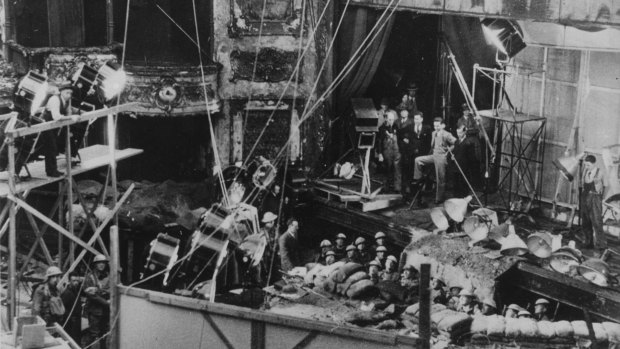 Diggers (1931): Filming the trench scenes of the WWI comedy, produced and directed by F. W. Thring, in the derelict His Majesty's Theatre, Exhibition Street, Melbourne.