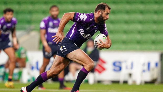 Cameron Smith on the run for the Storm against Canberra at AAMI Park on Saturday night. 