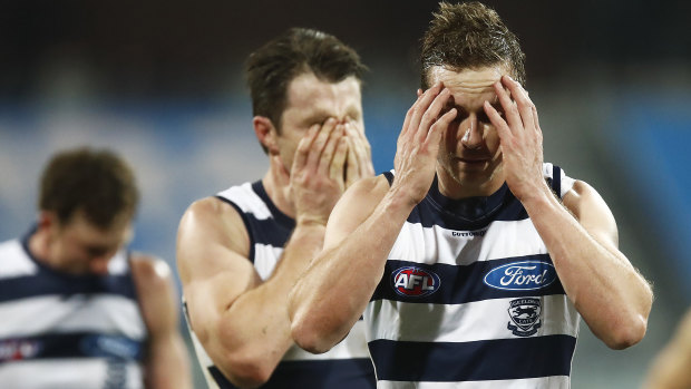 Cats lose their cool: Mitch Duncan and Patrick Dangerfield walk off after the round 3 loss to Carlton at their home ground 'fortress' GMHBA Stadium in Geelong.