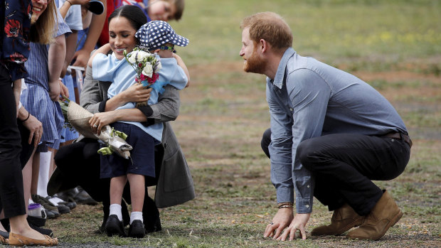 The Duke and Duchess of Sussex meet Luke Vincent, 5, during their visit to Dubbo on Wednesday.