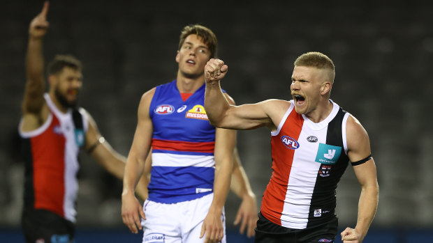 Fit and firing: Dan Hannebery celebrates a major for the Saints against the Western Bulldogs at Marvel Stadium.