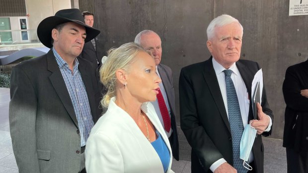 Former Logan councillors Phil Pidgeon, Trevina Schwarz and Russell Lutton, with Ms Schwarz’s lawyer Terry O’Gorman outside Brisbane Magistrates Court after their fraud charges were dropped.