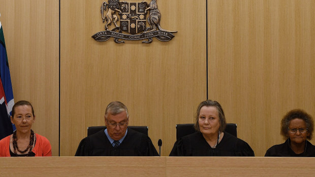 Indigenous elder Joanne Selfe, Children's Court President Peter Johnstone, Magistrate Sue Duncombe and Indigenous elder Pat Field at the ceremonial sitting of the Youth Koori Court in Surry Hills on Wednesday.