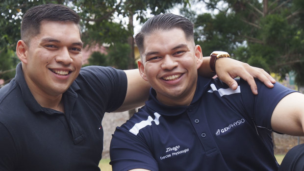 Zivago Baron (right) with his twin brother Zivanko, another USQ graduate.