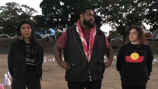 Ruby Wharton (left), Bo Spearim and Larissa Baldwin at the Musgrave Park vigil.