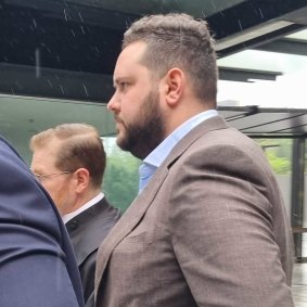 Kelvin Zachary Andrews leaves the Brisbane Magistrates Court after a magistrate ruled there was not enough evidence for his case to proceed to trial.