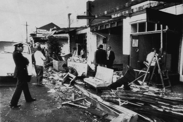 The wreckage outside the Footscray travel agency after the bombing.
