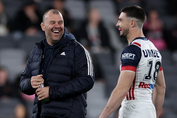 Michael Cheika talks to Roosters outside back Cody Ramsey.
