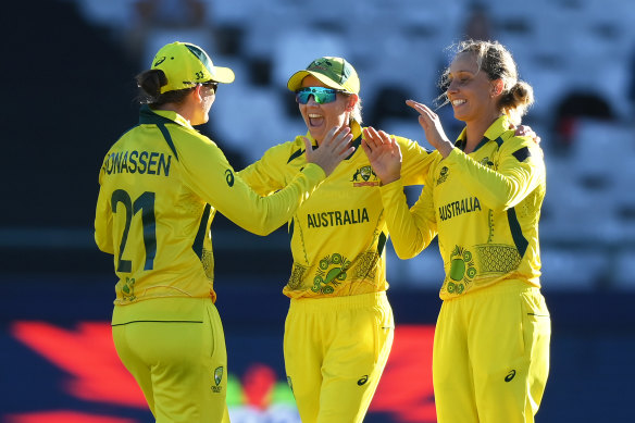 Jess Jonassen, Meg Lanning and Ashleigh Gardner celebrate at Cape Town.