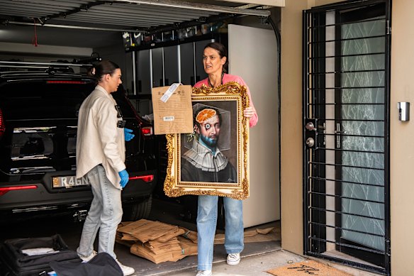 Police removed possible evidence from Annalouise Spence's Erskineville home during a search warrant Wednesday.