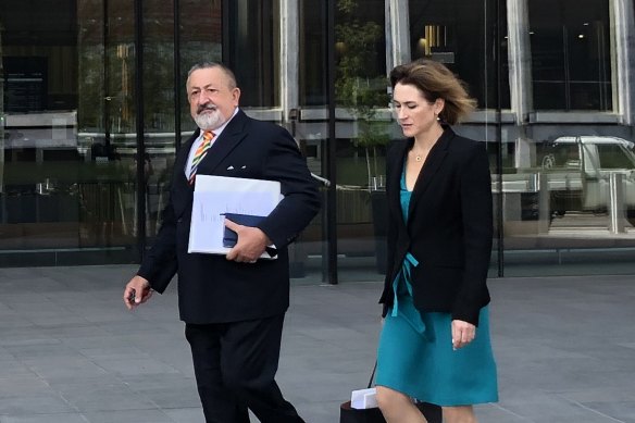Defence barrister Jack Pappas leaves the ACT Courts after his client, Rick De Marco, had charges against him relating to a salmonella outbreak dropped.