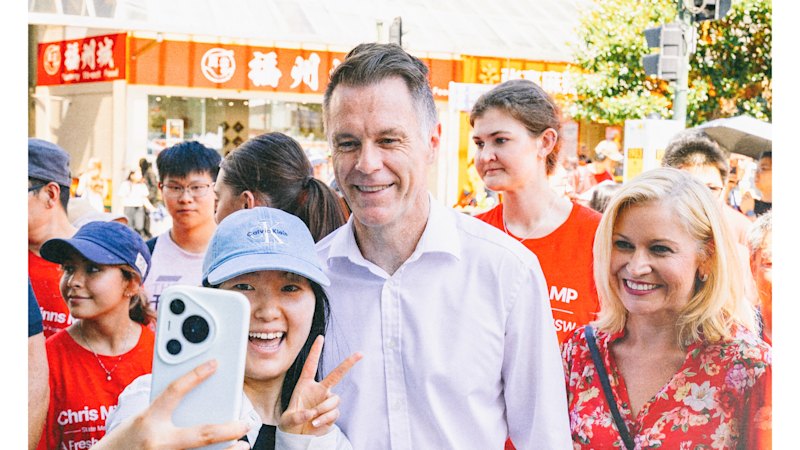 The Labor candidate, her rival – and the embarrassing fridge magnet
