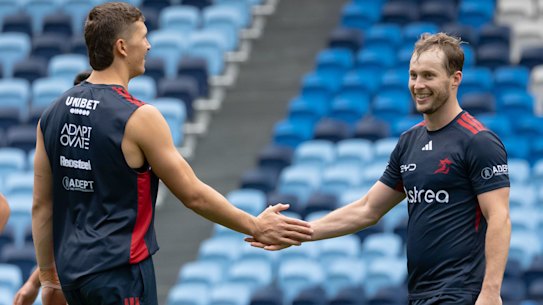 Hugo Savala greets Sam Walker.