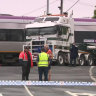 Driver killed after V/Line train collides with truck at Geelong