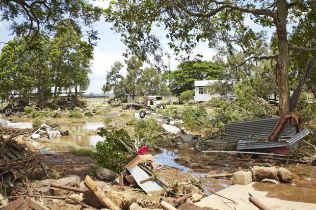 Emergency services search for bodies in the town of Grantham, devastated by the sudden flood.