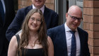 Paula Hitchcock and her husband Nassib Thoumi leave court after Wednesday’s decision.