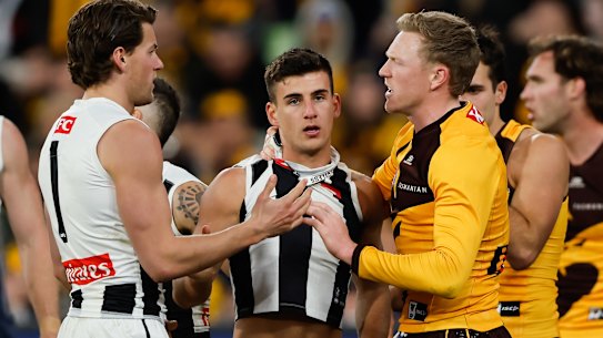 Nick Daicos in the thick of it for Collingwood against Hawthorn.