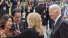 President Joe Biden, and first lady Jill Biden greet Prime Minister Fumio Kishida, and his wife Yuko Kishida, at the White House.