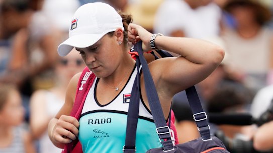 Ash Barty leaves the court after her upset loss.