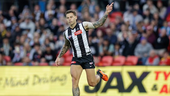 Jamie Elliott celebrates a goal for Collingwood.
