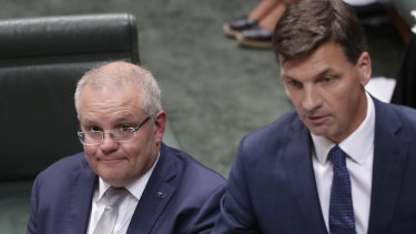 Energy Minister Angus Taylor (right) will be defending Australia's carbon emissions targets, including the plan by Prime Minister Scott Morrison (left) to use so-called Kyoto carryover credits to count against the Paris target.
