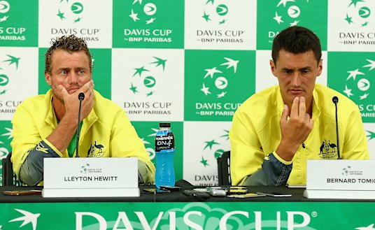 Tomic (right) and former world No.1 Lleyton Hewitt have a complicated relationship.