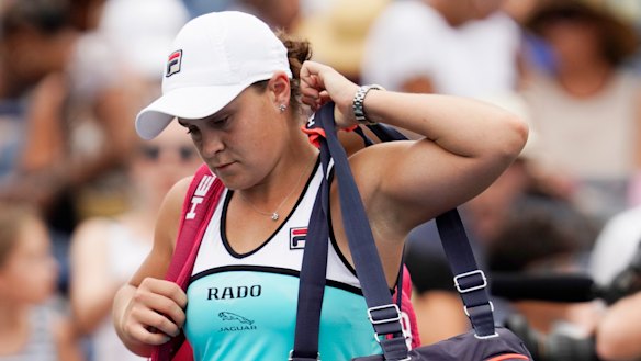 Ash Barty leaves the court after her upset loss.