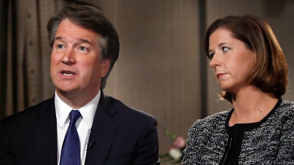 Brett Kavanaugh, with his wife Ashley Estes Kavanaugh, during a Fox News interview.